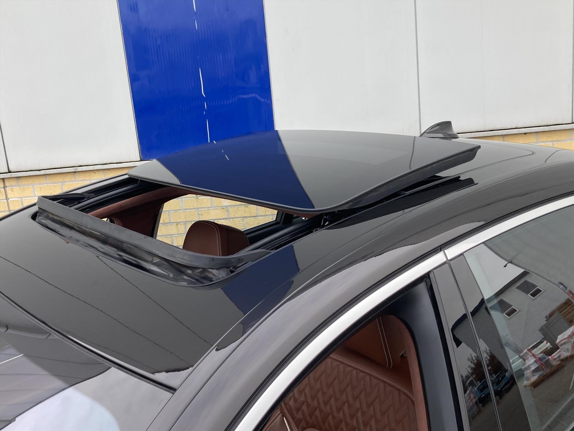 BMW 7 Serie 750Li xDrive 450pk Aut High Executive Individual, Auto's, Automaat, Gebruikt, Bruin, 4395 cc