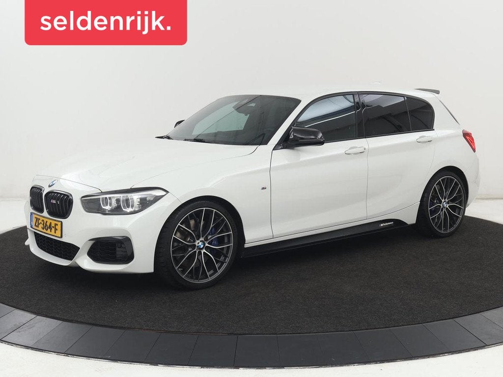 BMW 1-serie M140i High Executive | Stoelverwarming | Carplay, Achterwielaandrijving, Gebruikt, Euro 6, 6 cilinders