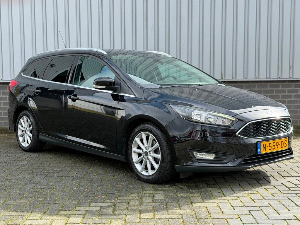Ford Focus Wagon 1.0 Titanium |Navi|CruiseCtrl|PDC|Stuur/Sto, Auto's, Ford, Gebruikt, Zwart, Handgeschakeld, 1216 kg