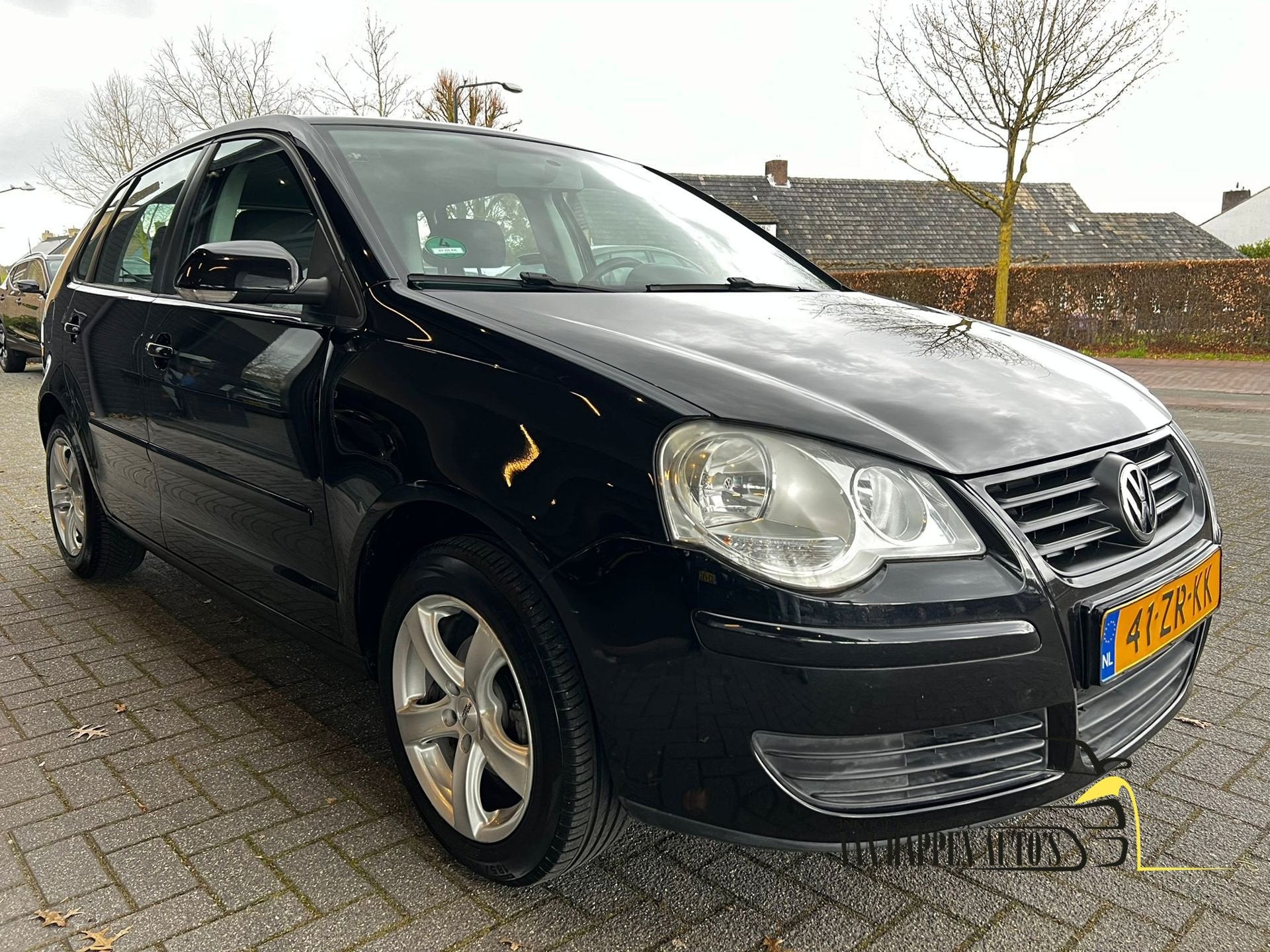 Volkswagen Polo 1.4-16V Optive / automaat / apk 7-2027, Auto's, Stof, Zwart, 4 cilinders, Zwart