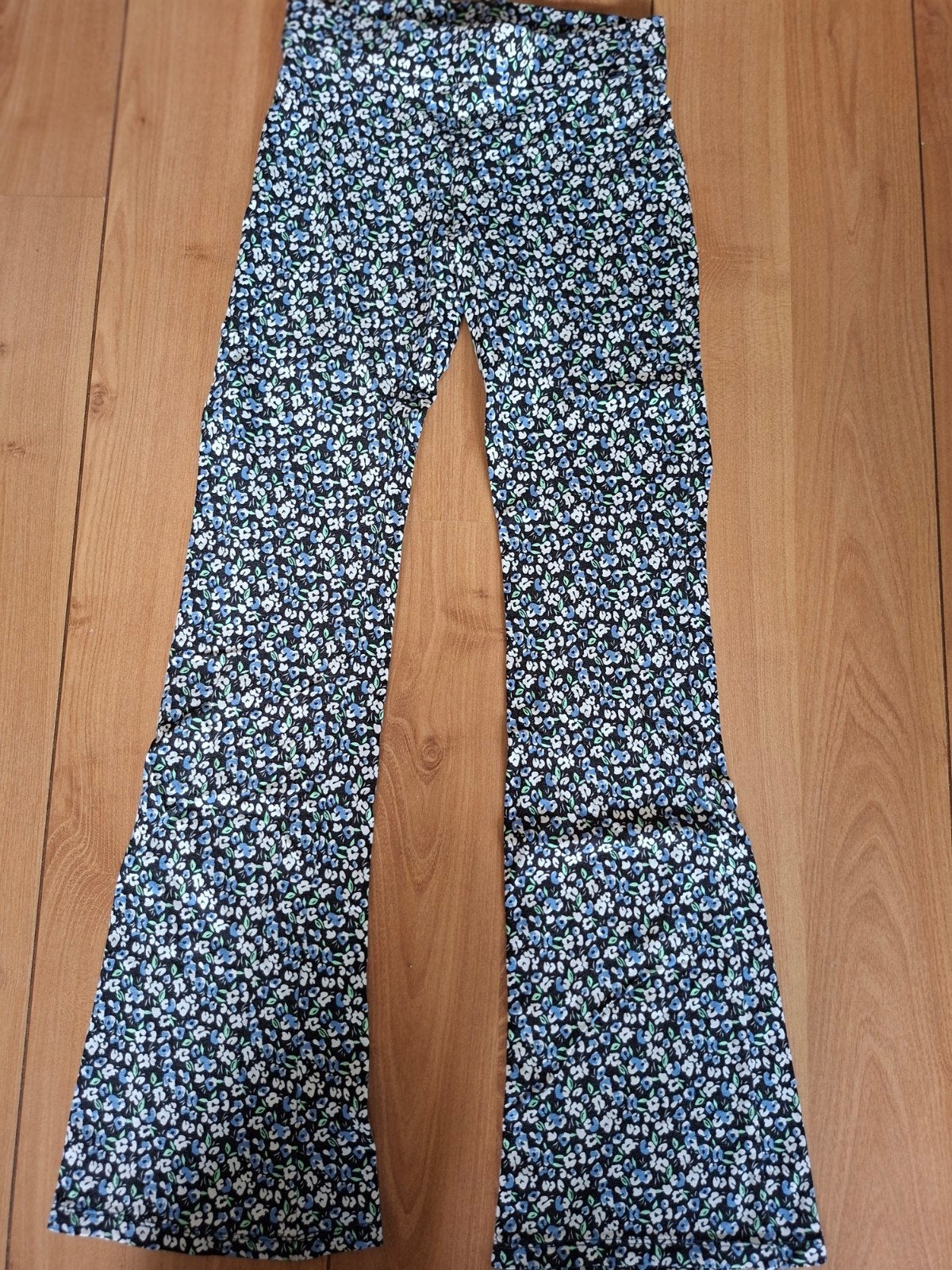 WE flared stretch legging met bloemetjesprint maat 140, Broek, WE, Meisje, Ophalen of Verzenden