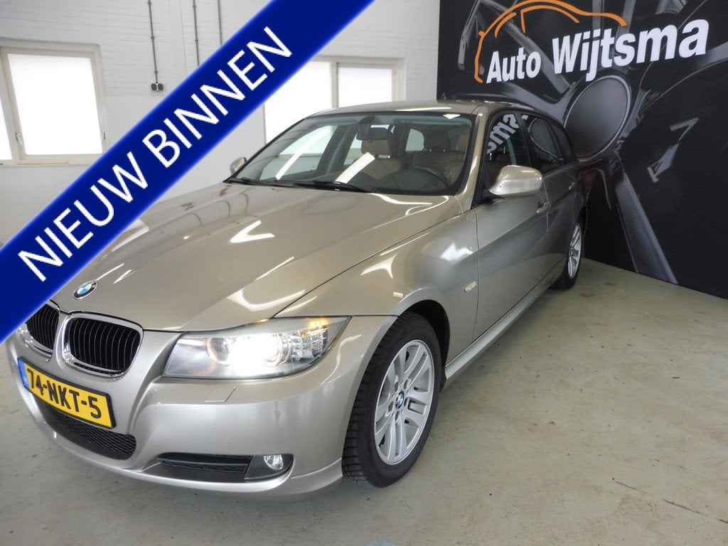 BMW 3 Serie Touring 320i Business Line 170PK Leer | Navi | L, Euro 5, Achterwielaandrijving, Zwart, 4 cilinders