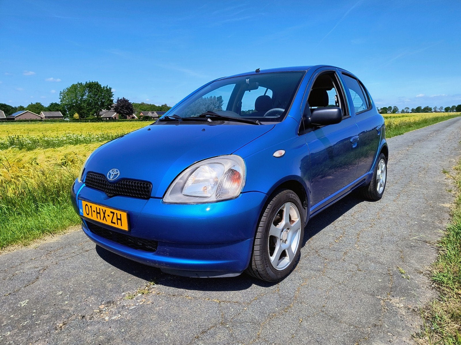 Toyota Yaris 1.0 16V Yorin 5DR 2002 Blauw <NW APK!>, Auto's, Voorwielaandrijving, Stof, 31 €/maand, 4 cilinders