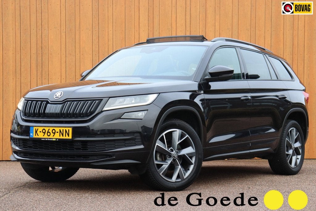 Skoda Kodiaq 1.5 TSI Sportline Business org NL-auto half-lee, Auto's, Skoda, 12 maanden, Euro 6, 4 cilinders, Zwart
