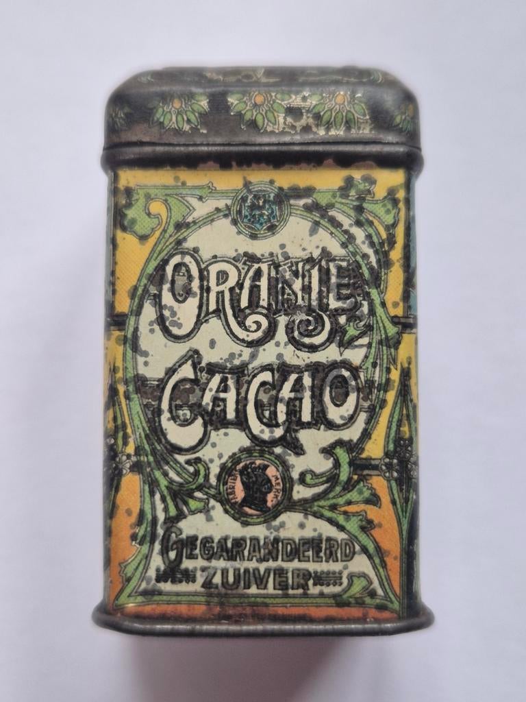 Oranje Cacao Monster blikje Koningin Wilhelmina Helmond, Verzamelen, Blikken, Ophalen of Verzenden, Gebruikt, Overige
