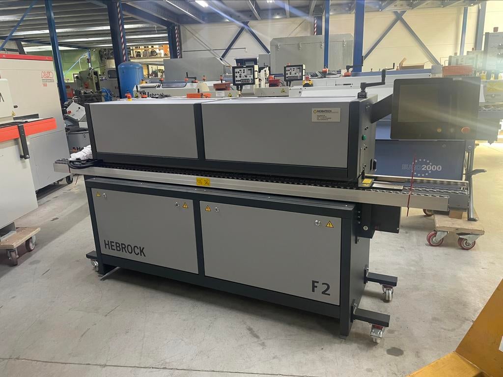 Kantenlijmer specialist bied aan nieuwe  hebrock f2, Zakelijke goederen, Machines en Bouw | Houtbewerking, Ophalen of Verzenden