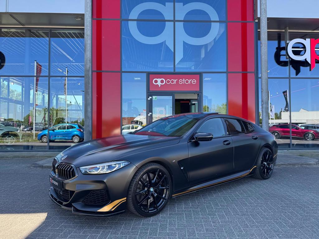 BMW 8-serie Gran Coupé M850i xDrive High Executive Golden T, Automaat, Gebruikt, 4395 cc, Zwart