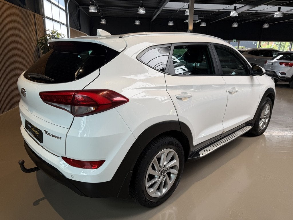 Hyundai Tucson 1.6 GDi Comfort cruise/climate control en nav, Auto's, Hyundai, Voorwielaandrijving, Gebruikt, 4 cilinders, Leder en Stof