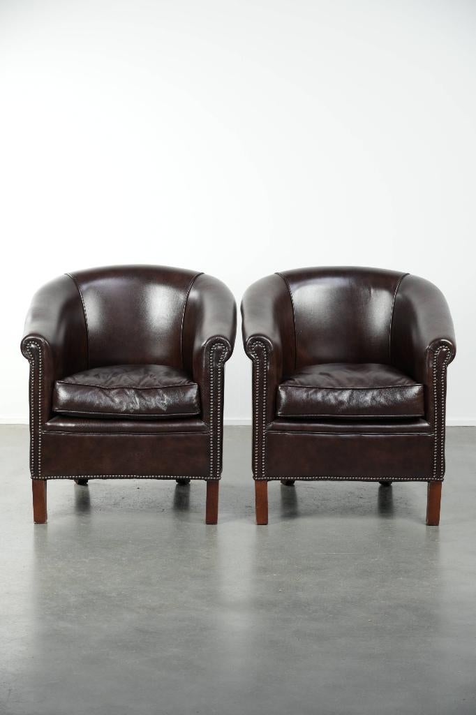2x In goede staat verkerende donkere rundleren clubfauteuil, Huis en Inrichting, Fauteuils, Ophalen, Gebruikt, ., Minder dan 75 cm