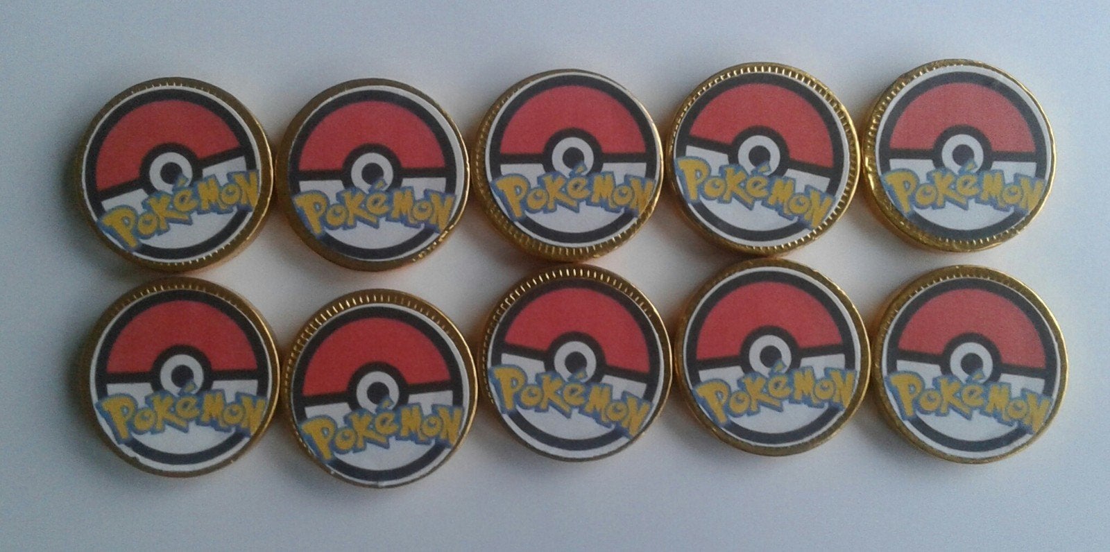 Set van 10 Pokemon traktatie chocolademunten, Ophalen of Verzenden, Nieuw, Versiering, Verjaardag