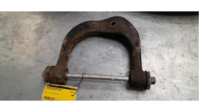 Draagarm boven rechts-voor van een Toyota Landcruiser, Gebruikt, -, -, Ophalen of Verzenden