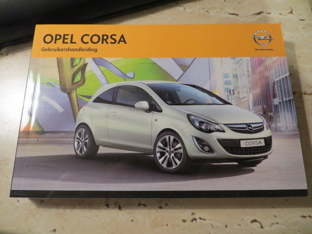 Instructieboek Opel Corsa 2011 + handleiding audio/navigatie, Ophalen of Verzenden