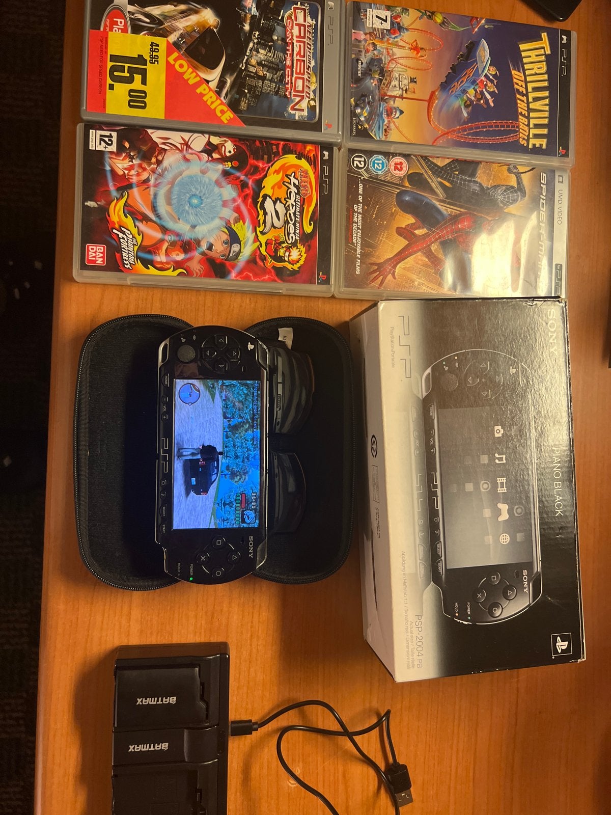 Sony PSP-2004 PB met 4 games en accessoires, Spelcomputers en Games, Met games, Ophalen of Verzenden, Zo goed als nieuw, PSP Slim