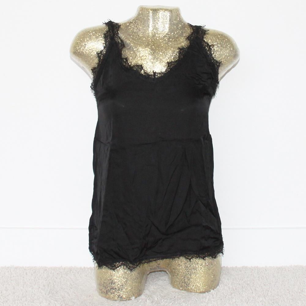 Schitterend Transfer Topje - 80 (M) € 25,-