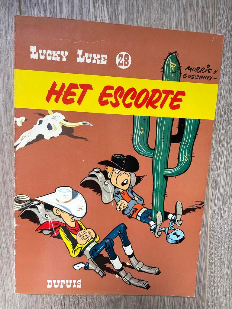 Lucky Luke 28 - Het Escorte (1970), Boeken, Stripboeken, Eén stripboek, Ophalen of Verzenden, Gelezen