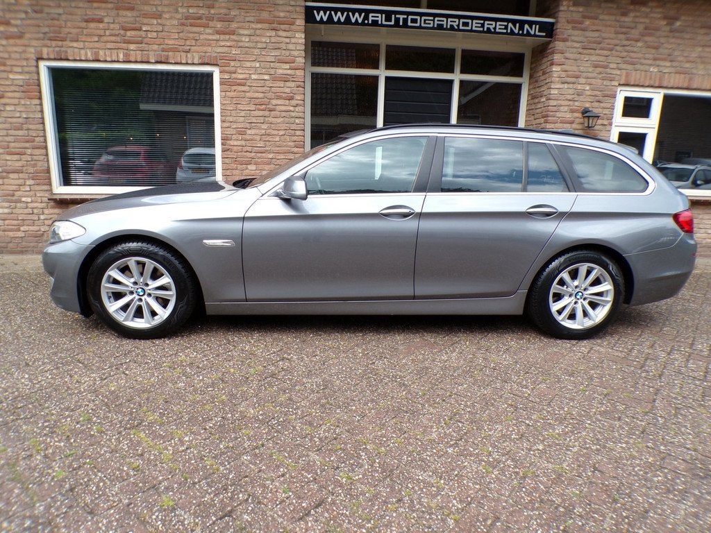 BMW 5-serie Touring 520d High Executive Automaat / Leder / N, Auto's, Automaat, Euro 5, Achterwielaandrijving, 2000 kg