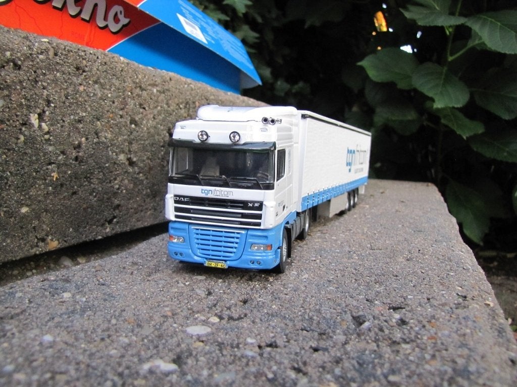 Tekno Daf XF met schuifzeiltrailer TGN Fritom., Hobby en Vrije tijd, Modelauto's | 1:50, Ophalen of Verzenden, Nieuw, Bus of Vrachtwagen