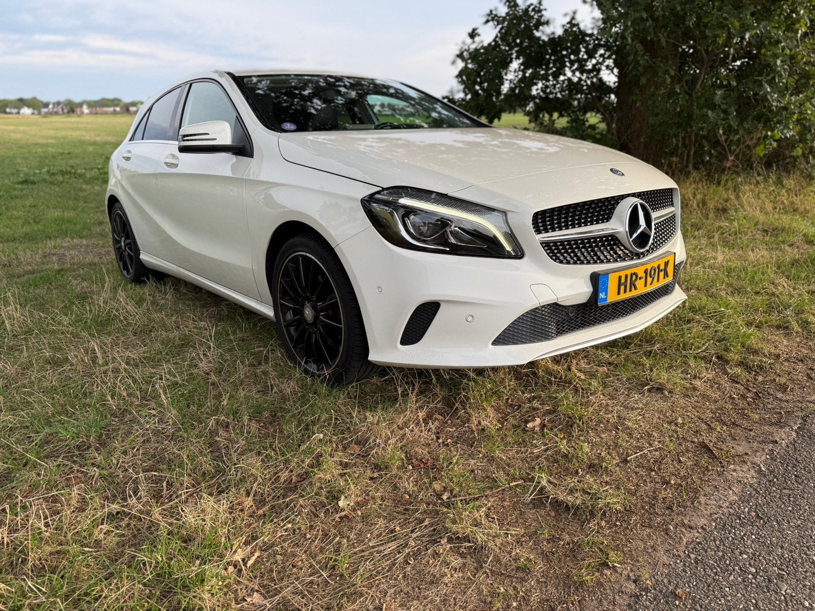 Mercedes A160 1.6 2016 109.143 km CarPlay Stoelverwarming, Voorwielaandrijving, Zwart, 4 cilinders, Leder en Stof
