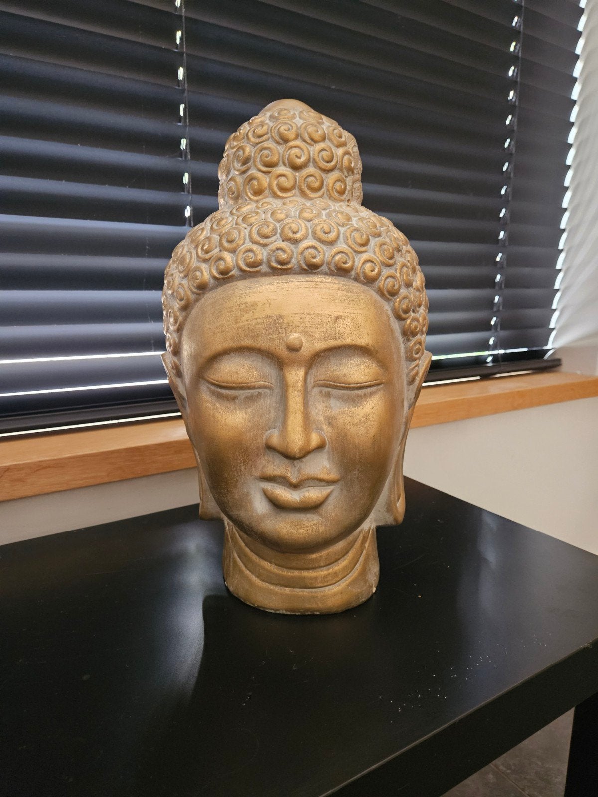 Gouden boeddha beeld, Ophalen