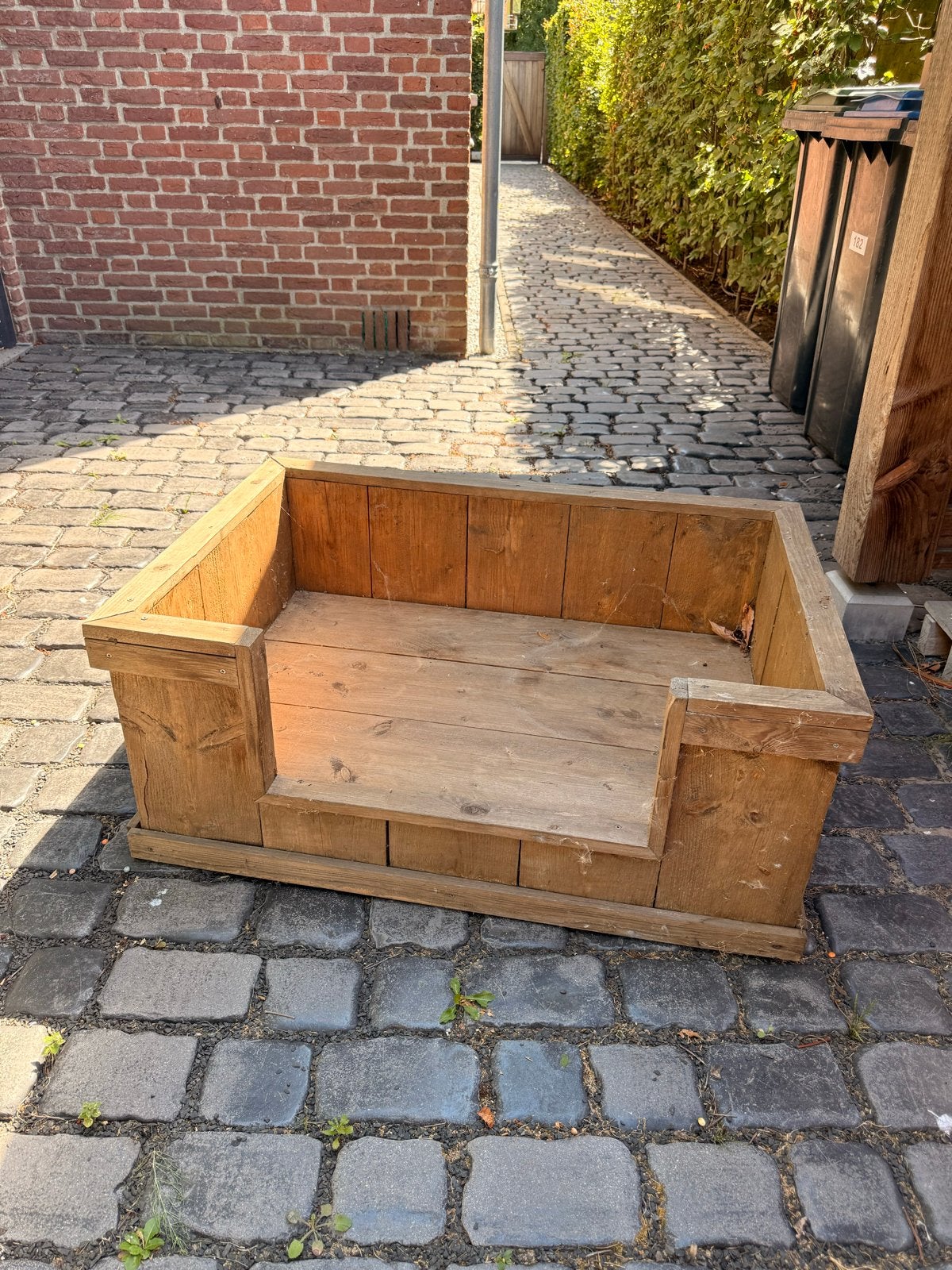 Hondenmand steigerhout, Ophalen