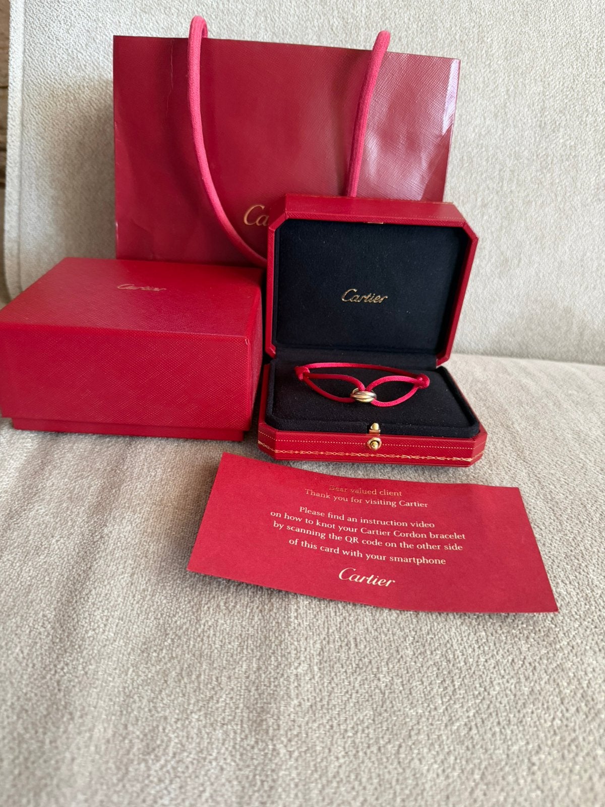 Cartier Trinity Armband, Ophalen of Verzenden, Zo goed als nieuw, Rood, Goud