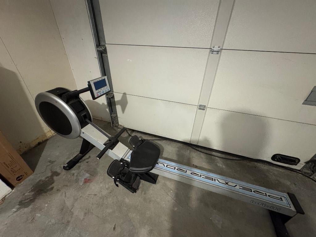 Infiniti R100APM roeitrainer met luchtweerstand, Ophalen, Gebruikt, Metaal, Roeitrainer