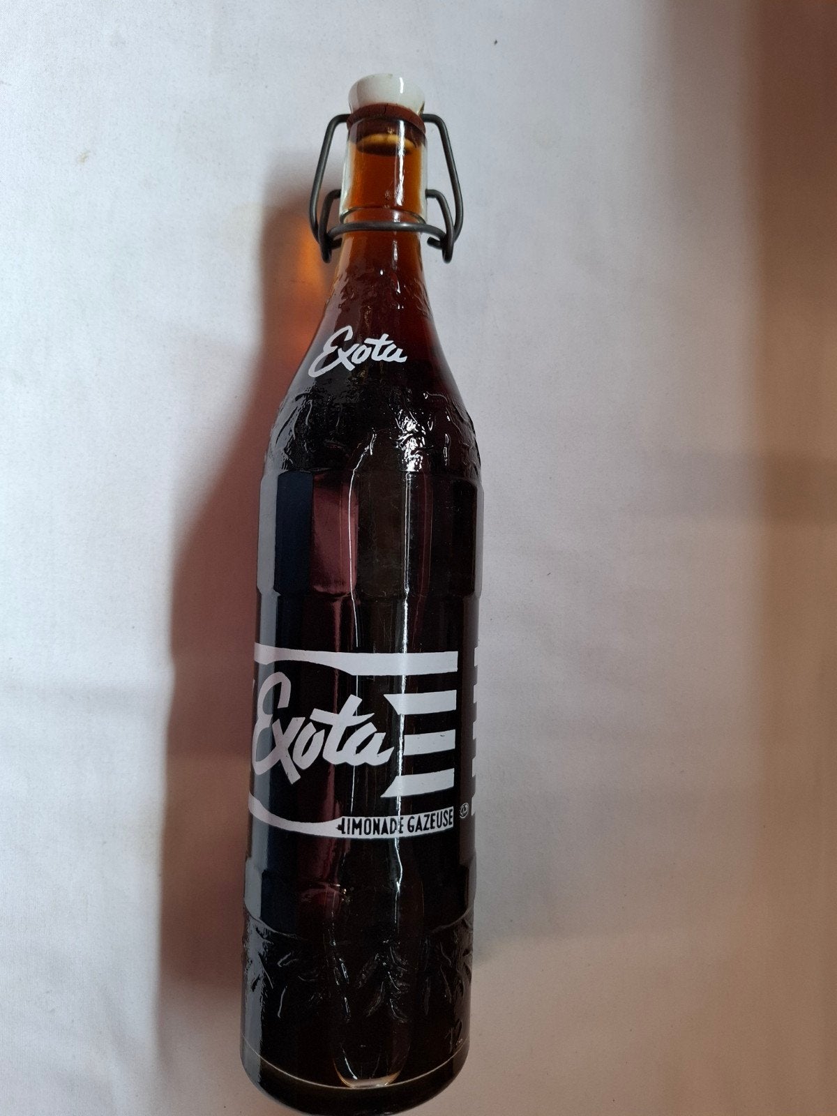 Mooie volle beugelfles van de Exota limonade uit Dongen, Ophalen of Verzenden, Zo goed als nieuw, Verpakking