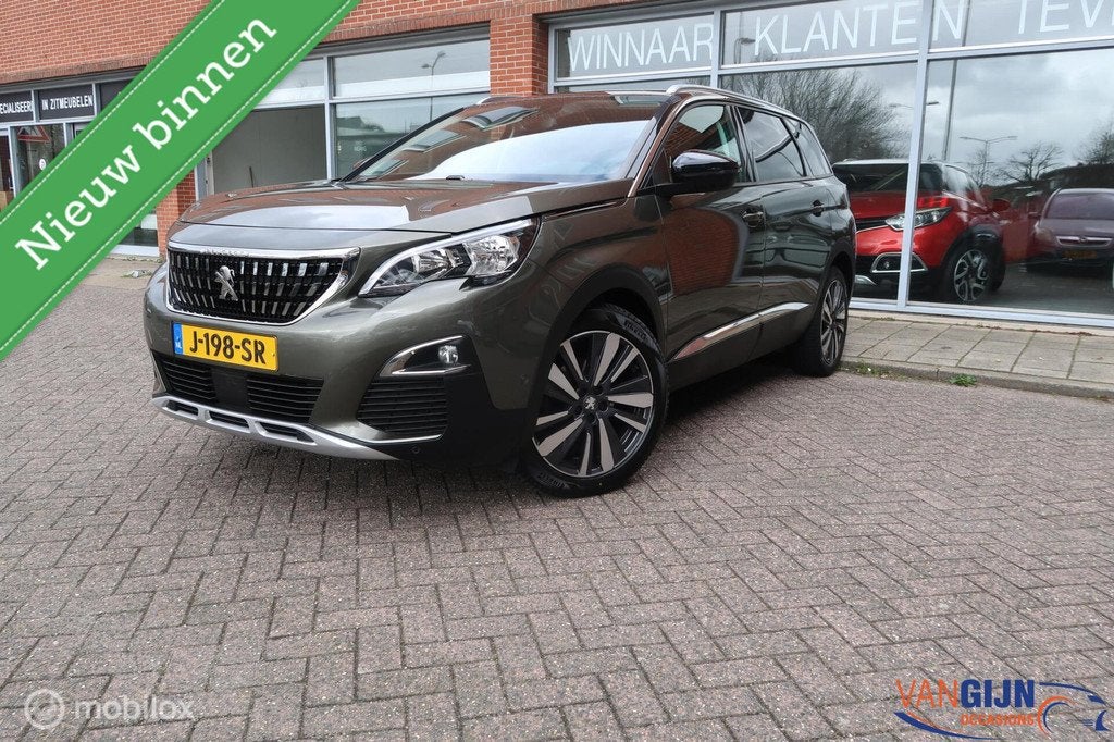 Peugeot 5008 1.2 PureTech Allure Automaat Navi 7 Persoons, Auto's, Peugeot, Gebruikt, Euro 6, 1199 cc, Grijs