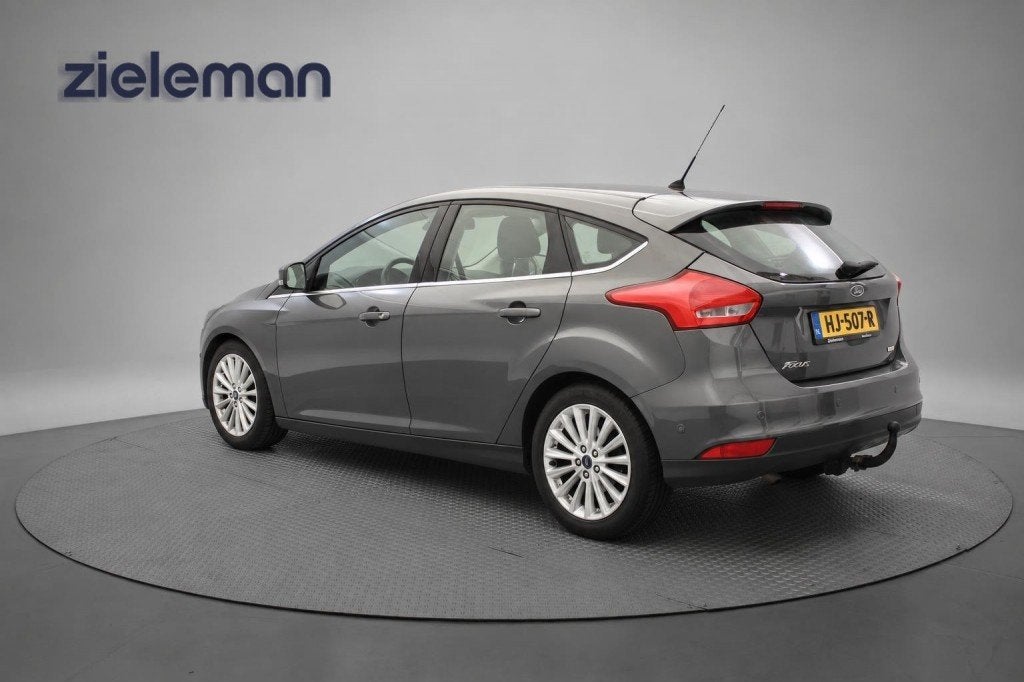 Ford FOCUS  1.0 Titanium - Navi, Clima, Trekhaak, cruise, Auto's, 125 pk, Gebruikt, Met garantie (alle), Handgeschakeld