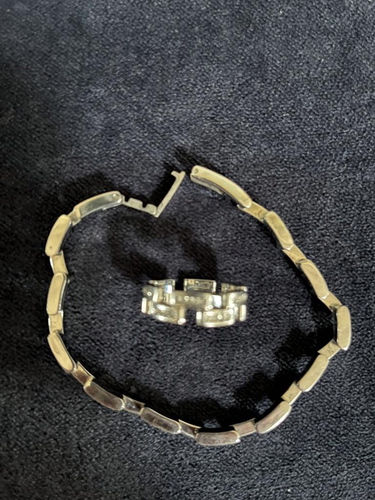 Schakelarmband en bijpassende ring staal, Sieraden, Tassen en Uiterlijk, Armbanden, Met kristal, Staal, Ophalen of Verzenden, Zo goed als nieuw