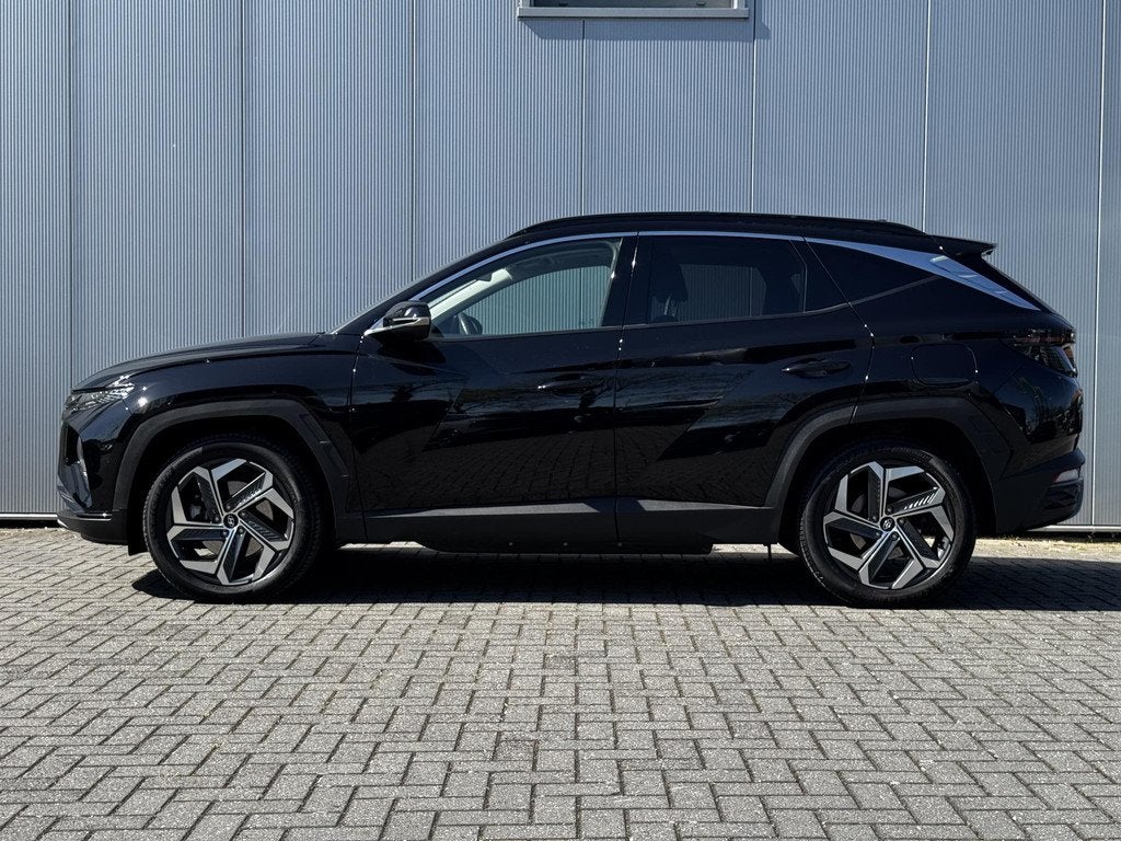 Hyundai Tucson 1.6 T-GDI PHEV Comfort Smart 4WD / Pano Dak /, Auto's, Hyundai, Automaat, 1350 kg, Gebruikt, Euro 6