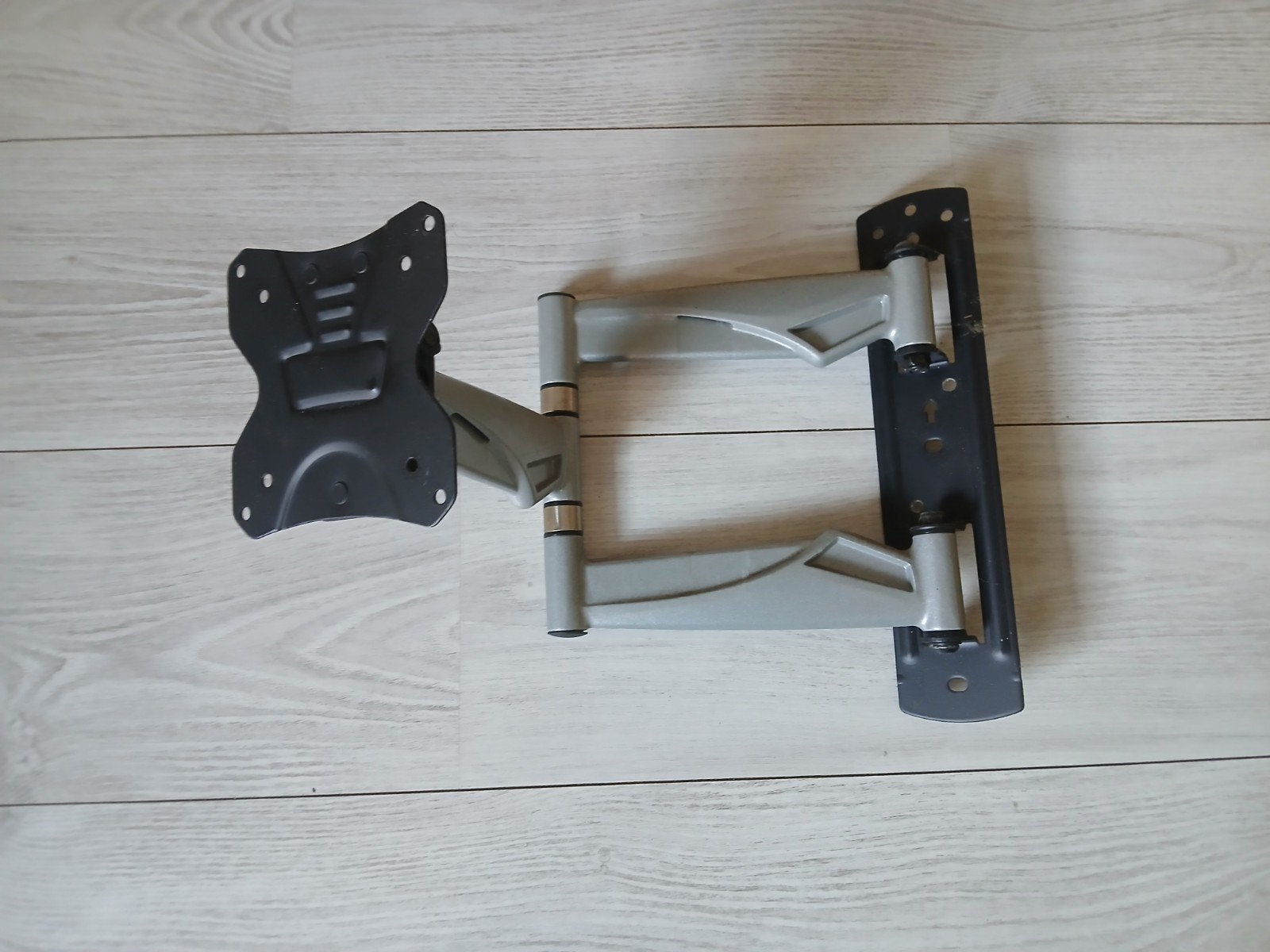 Tv beugel, Ophalen