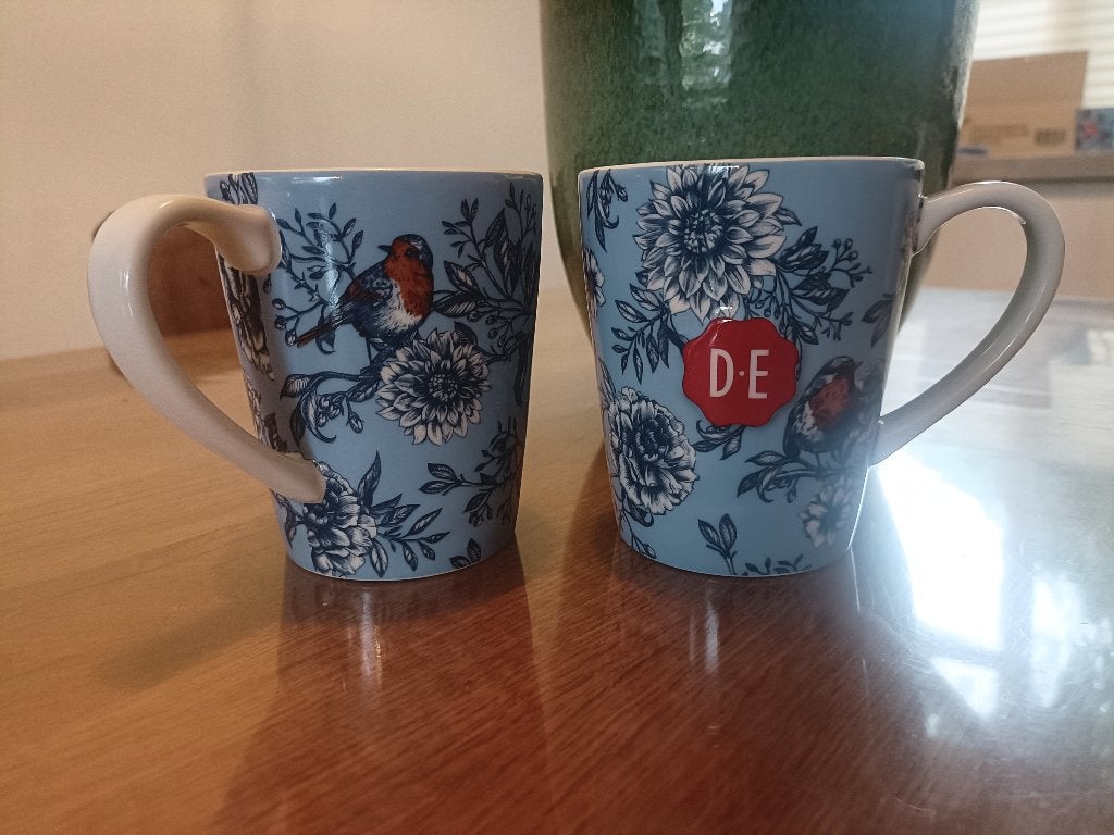 Douwe Egberts Theemokken Dutch Traditions Bloem Roodborstje, Huis en Inrichting, Keuken | Servies, Nieuw, Ophalen of Verzenden
