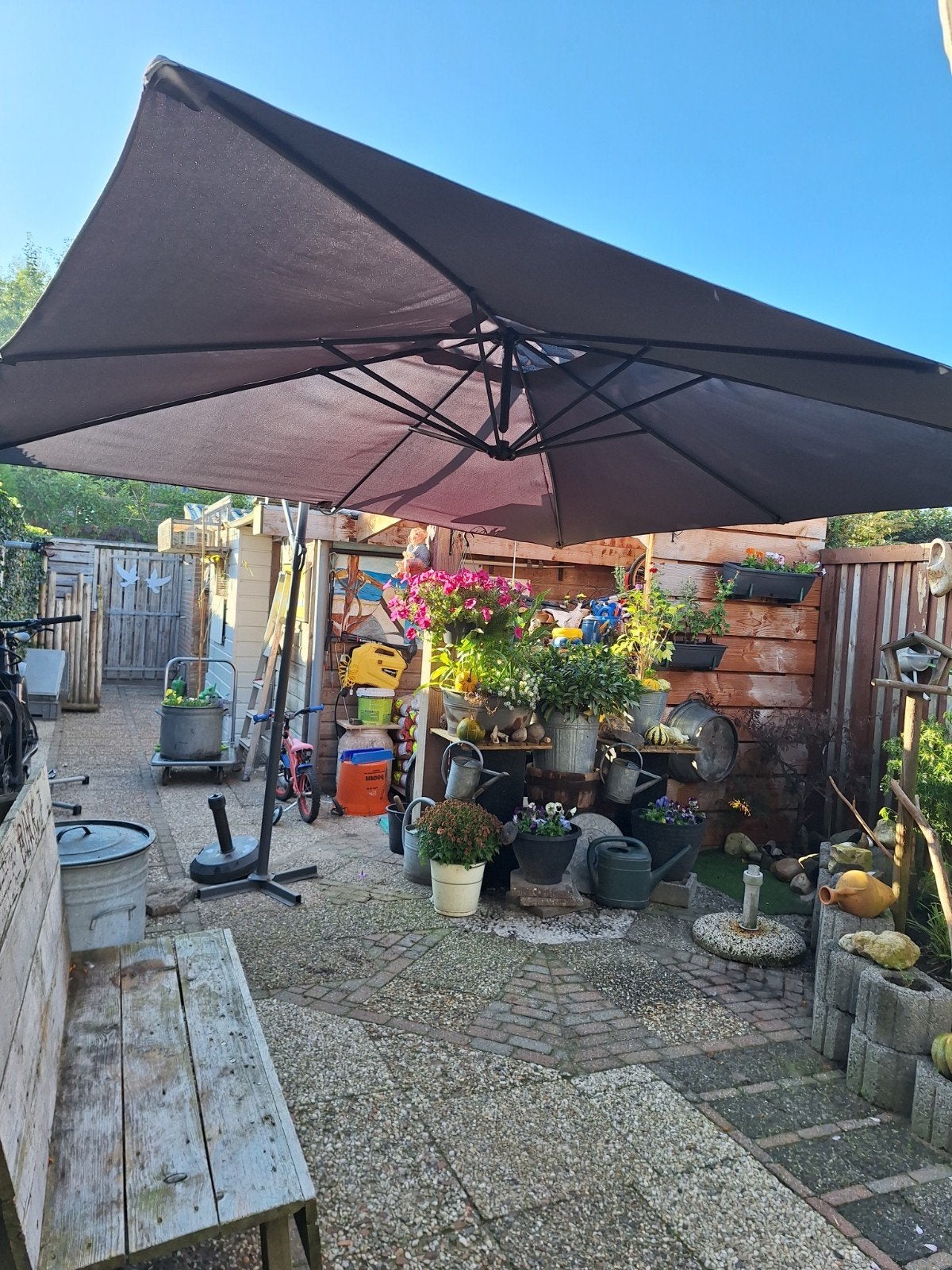 te koop parasol, Ophalen