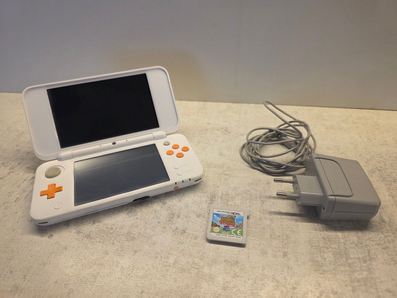 Nintendo 2DS XL Wit/Oranje met Animal Crossing, Spelcomputers en Games, Met games, Ophalen of Verzenden, Zo goed als nieuw, Wit