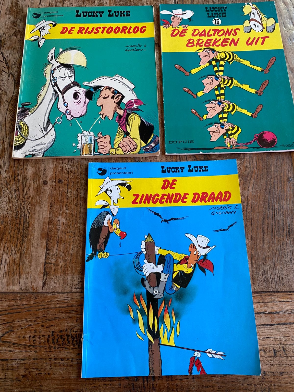 Lucky Luke : De Rijstoorlog, Daltons, Zingende Draad, Meerdere stripboeken, Ophalen of Verzenden, Zo goed als nieuw
