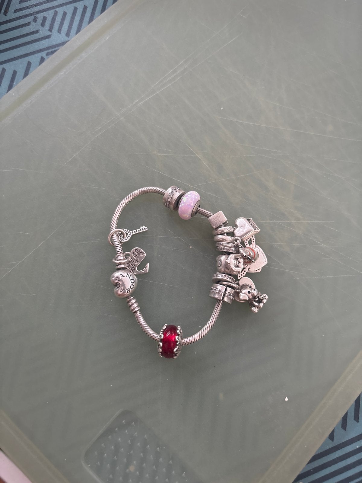 Pandora armband met diverse bedeltjes - Goede staat, Gebruikt, Pandora, Ophalen of Verzenden, 4 bedels of meer