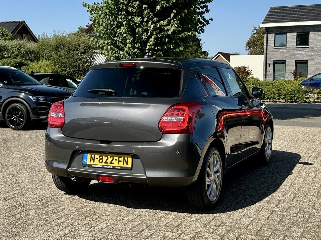 Suzuki Swift 1.2 Select Smart Hybrid Navi Camera Adaptive-Cr, Auto's, Suzuki, Keurmerk '100% Onderhouden', 83 pk, Stof, Gebruikt