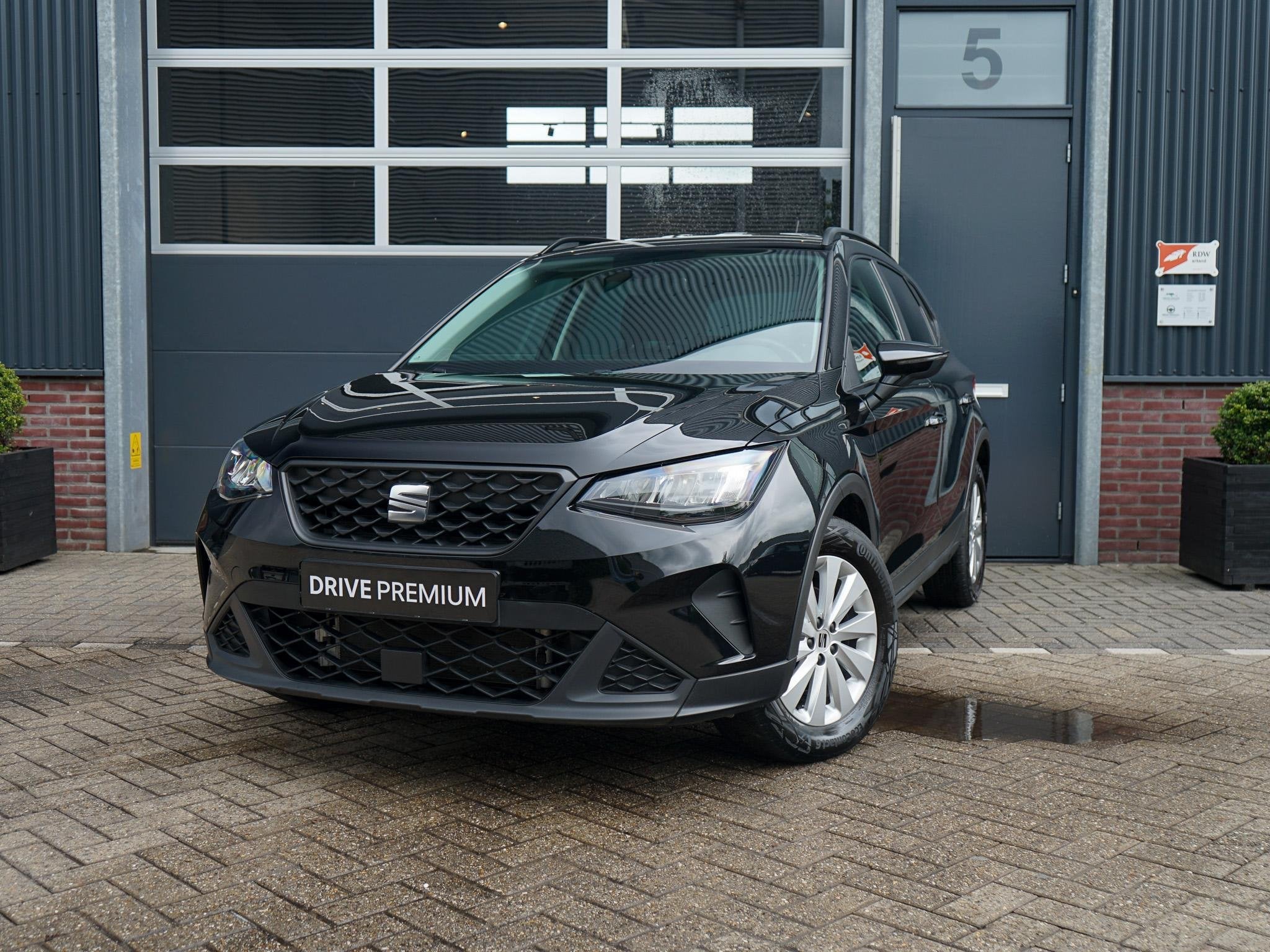 SEAT Arona 1.0 TSI Style, Auto's, Seat, Stof, Gebruikt, 610 kg, Zwart