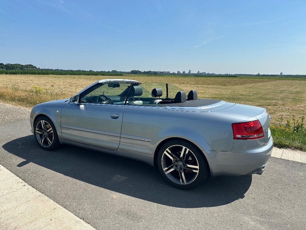 Audi A4 2.0 Tfsi 147KW Cabrio AUT 2009 Grijs - km stand 111k, Bluetooth, Zwart, 4 cilinders, 4 stoelen