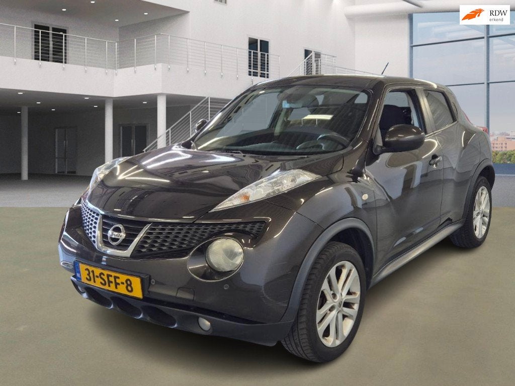 Nissan Juke 1.6 Acenta Eco NAVI PSENSOR CRUISE 2 X SLEUTELS, Auto's, Voorwielaandrijving, Euro 5, 4 cilinders, Bruin