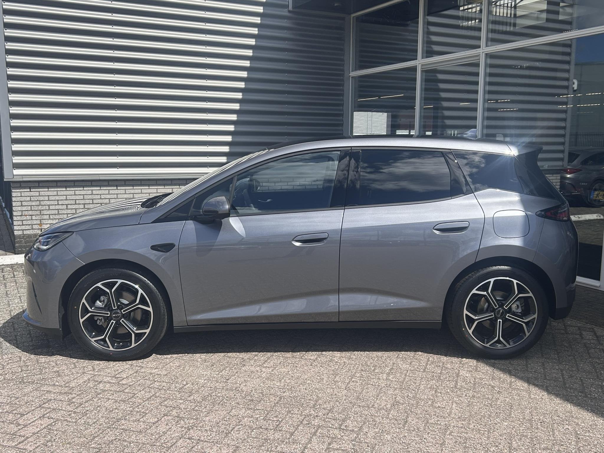 BYD DOLPHIN G 1.5L DM-i Comfort | Panoramadak | Adaptieve Cr, Auto's, BYD, Euro 6, 4 cilinders, Leder en Stof, Plug-in hybride