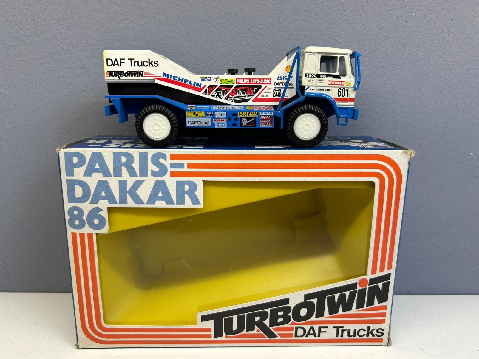 PORTEGIES DAF 3600 TURBO TWIN PARIS-DAKAR 86 601 JAN DE ROOY, Ophalen of Verzenden, Zo goed als nieuw, Bus of Vrachtwagen, Lion Toys