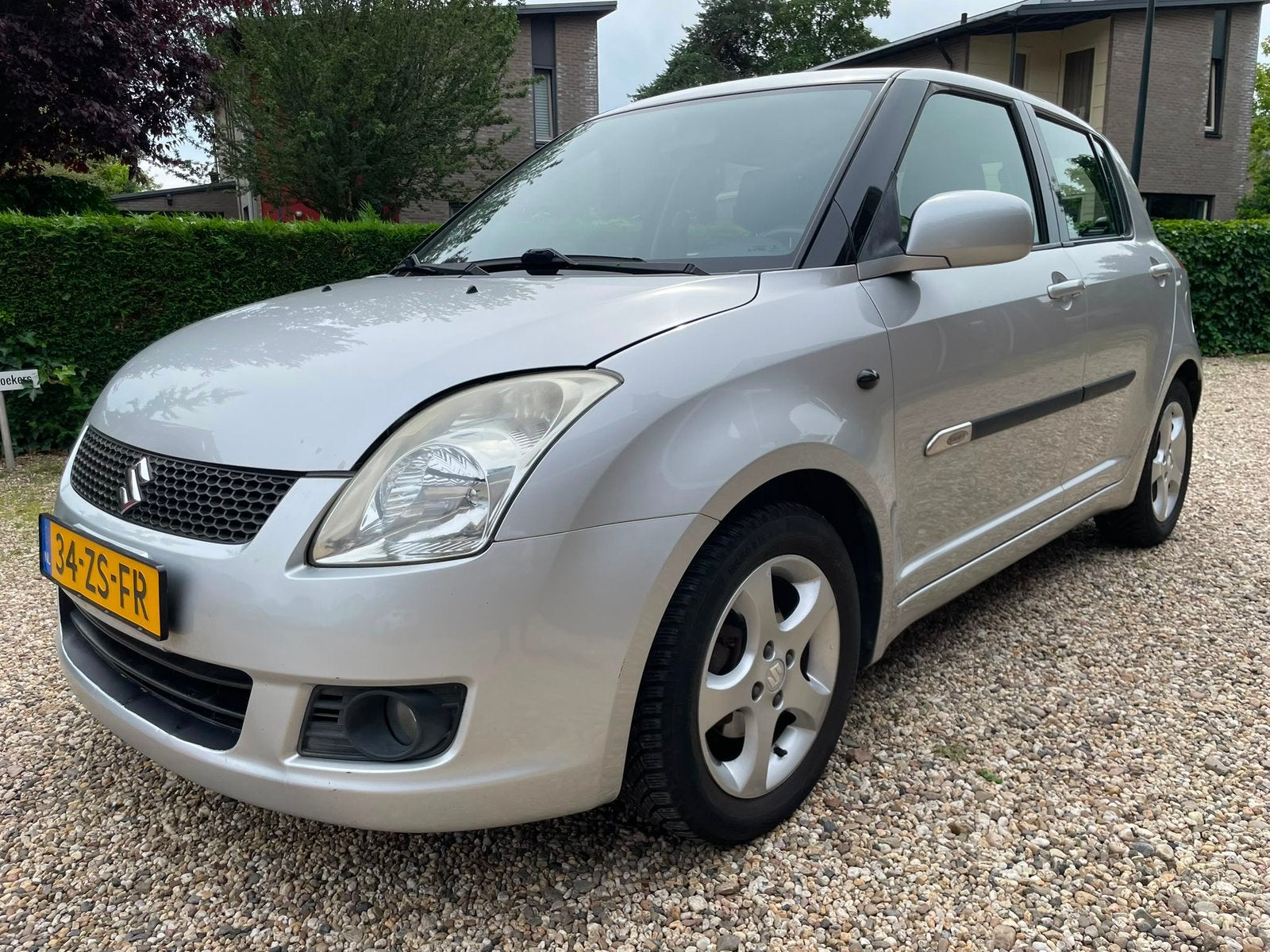 Suzuki Swift 1.3 5DRS 2008 Grijs, Auto's, Suzuki, Voorwielaandrijving, Stof, 40 €/maand, Zwart