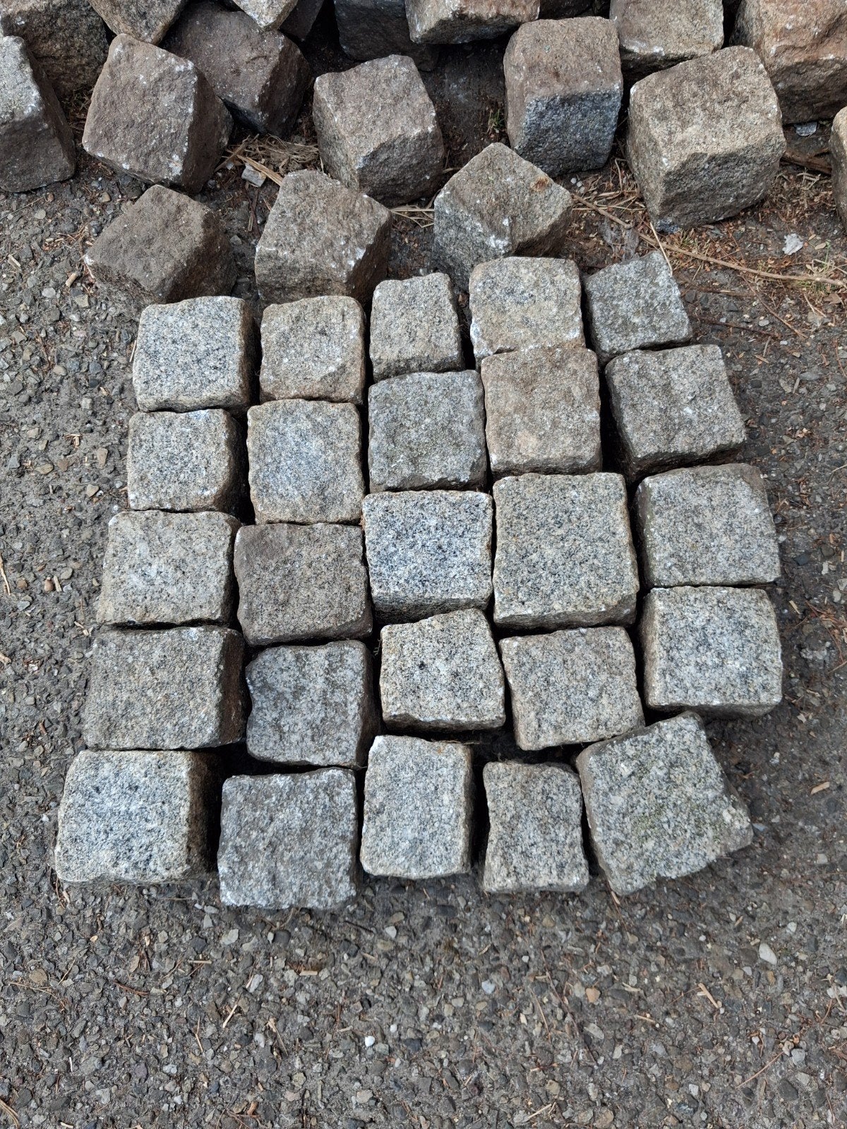 Portugees keitjes bestrating  matrieel, Ophalen