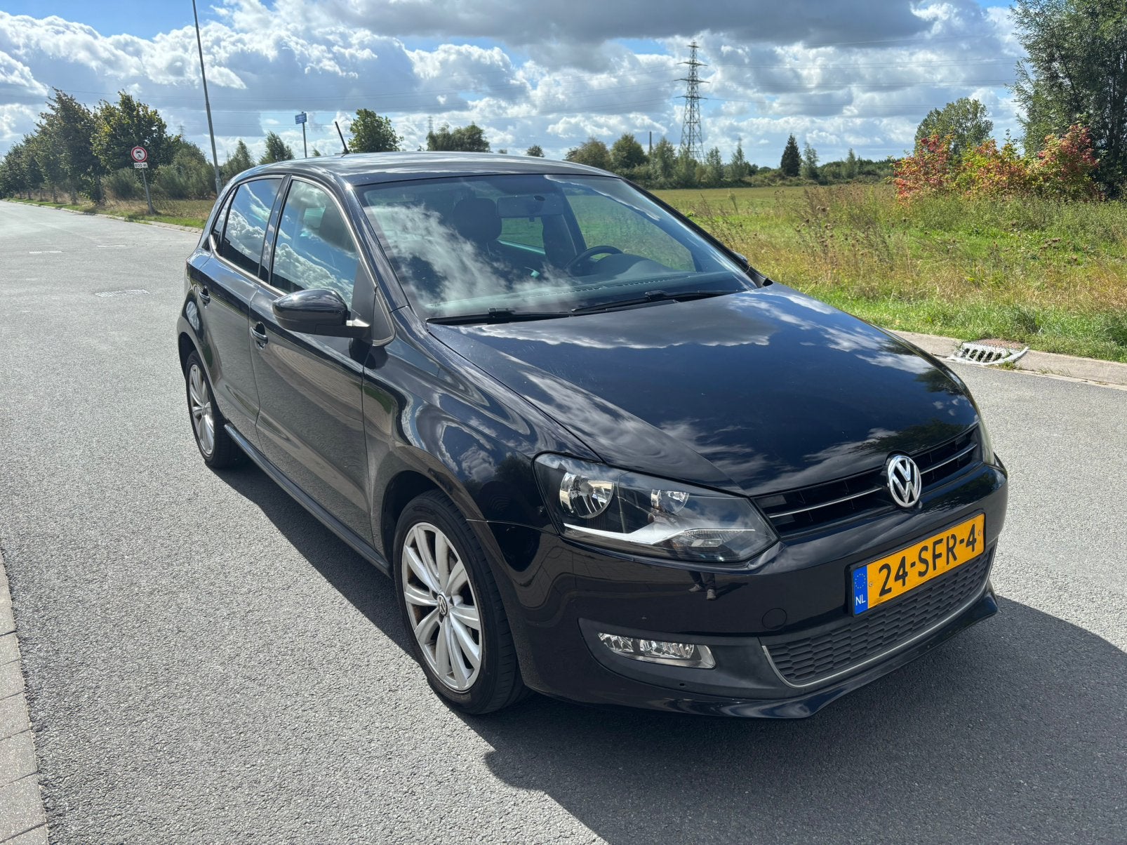 Volkswagen Polo 1.2 TSI 77KW 2011 Zwart, Auto's, Voorwielaandrijving, 40 €/maand, Zwart, Handgeschakeld