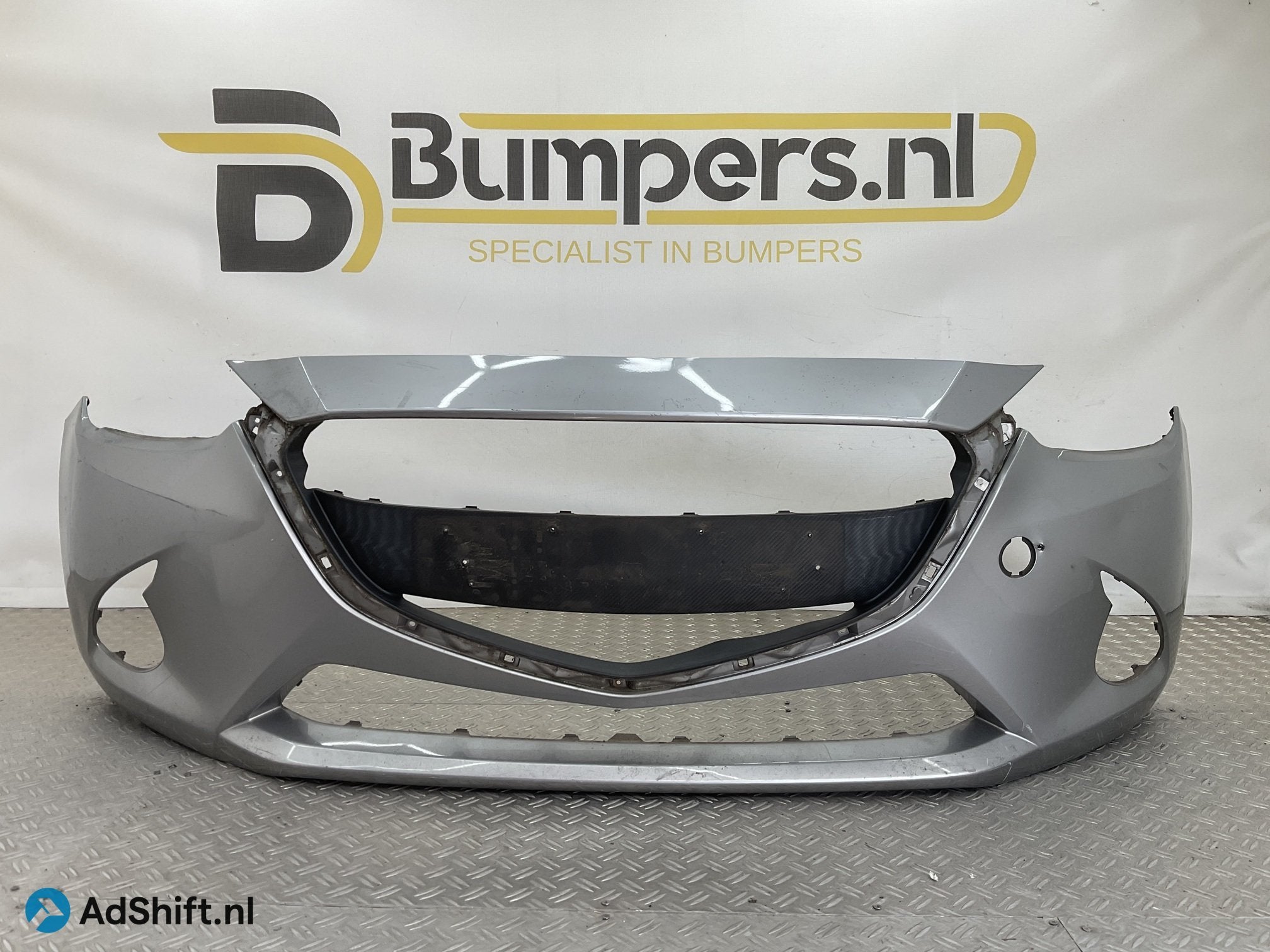 Bumper Mazda 2 2007-2014 DB5J-50031 Voorbumper B4-23261, Bumper