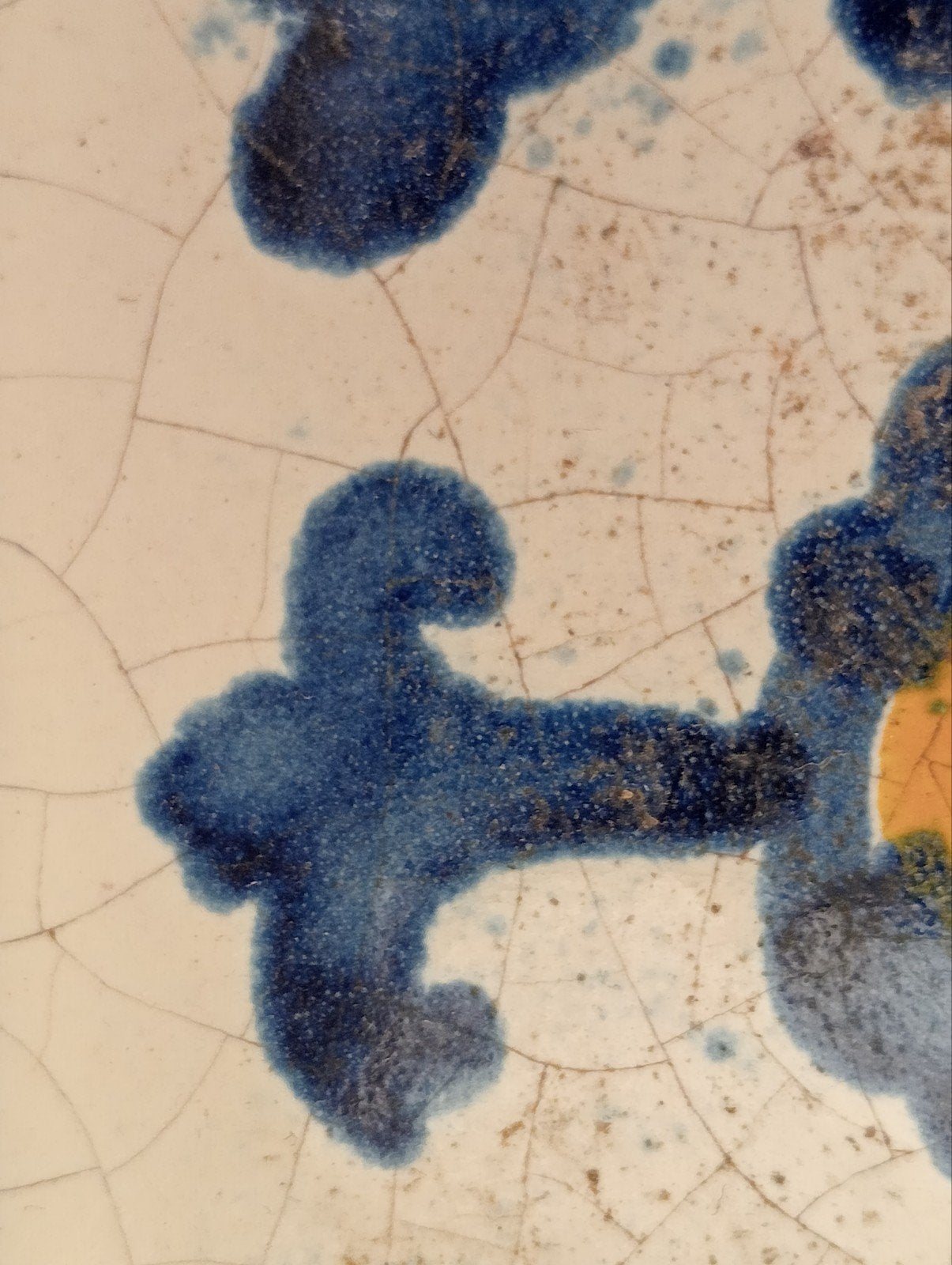 Handgeschilderde tegel - Blauw en Geel Bloempatroon, Ophalen of Verzenden