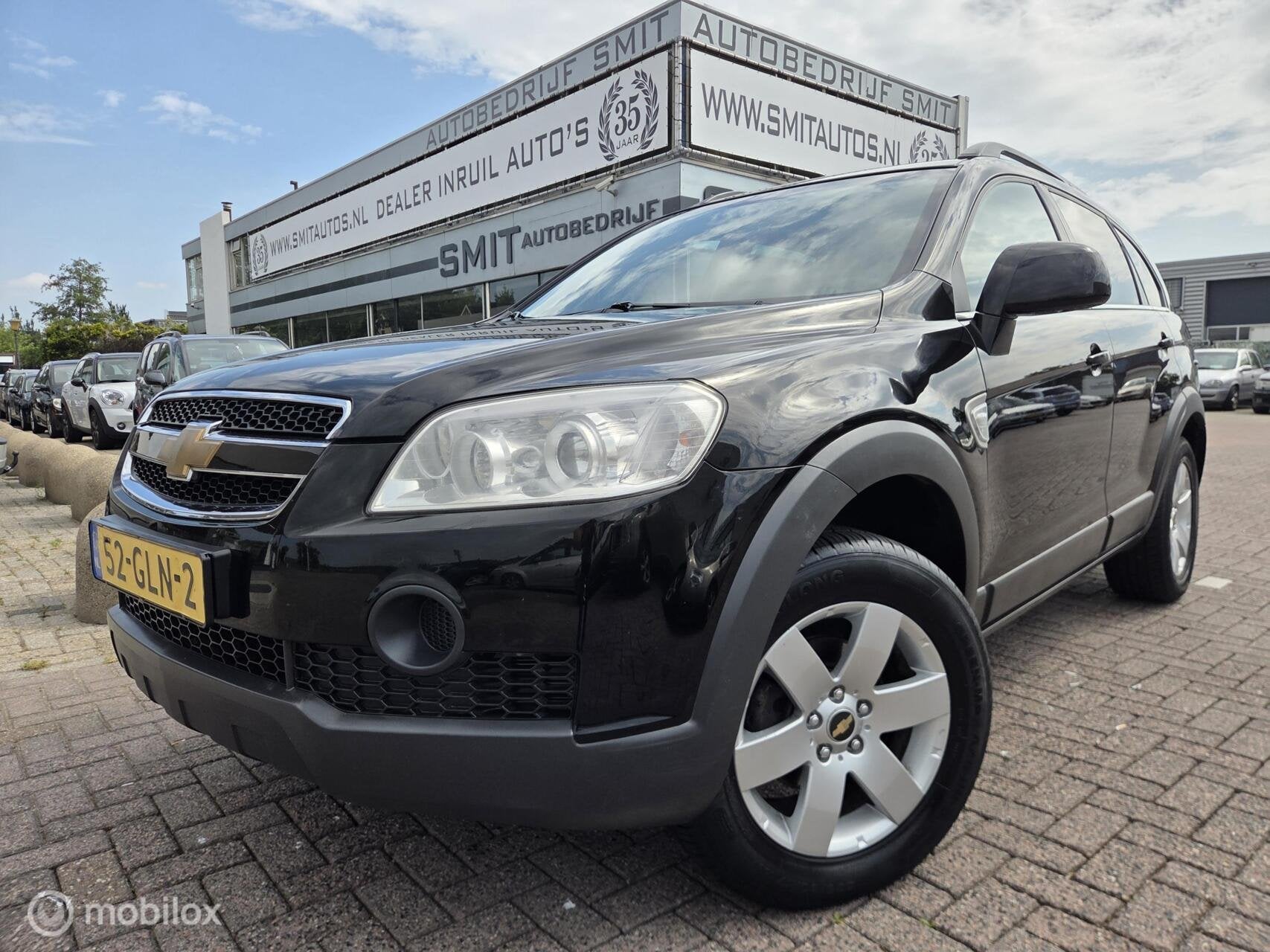 Chevrolet Captiva 2.4i Style 2WD 7PERS/AC/Trekhaak, Auto's, Chevrolet, Gebruikt, Zwart, 4 cilinders, Parkeersensor