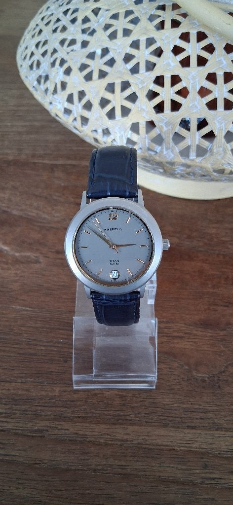 Prisma dameshorloge titanium (quartz)., Sieraden, Tassen en Uiterlijk, Horloges | Dames, Overige merken, Overige materialen, Leer